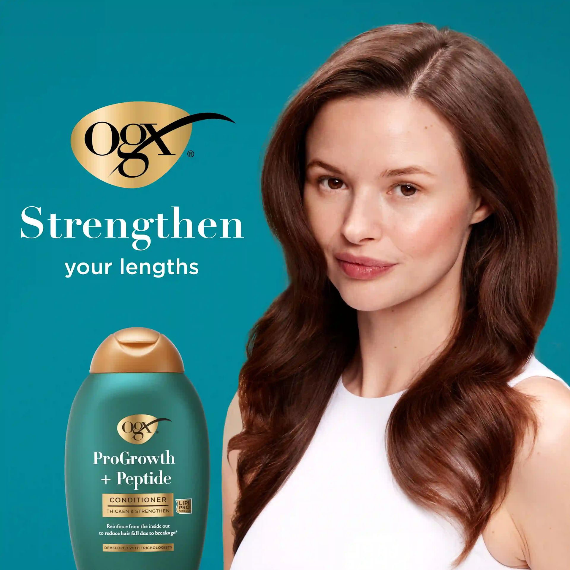 Woman with healthy hair after using ProGrowth + Peptide Conditioner. Strengthen your lengths