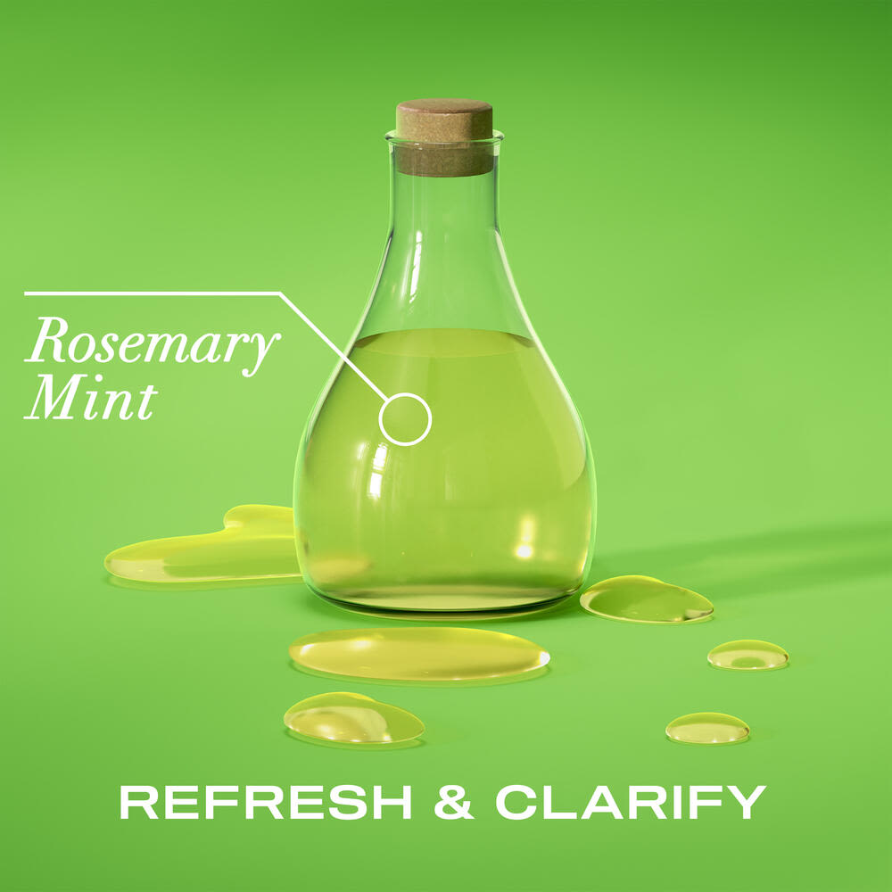 Front shot of a glass laboratory bottle filled with rosemary and mint oil