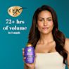 Woman holding Biotin & Collagen Shampoo. 72+ hrs of volume in 1 wash