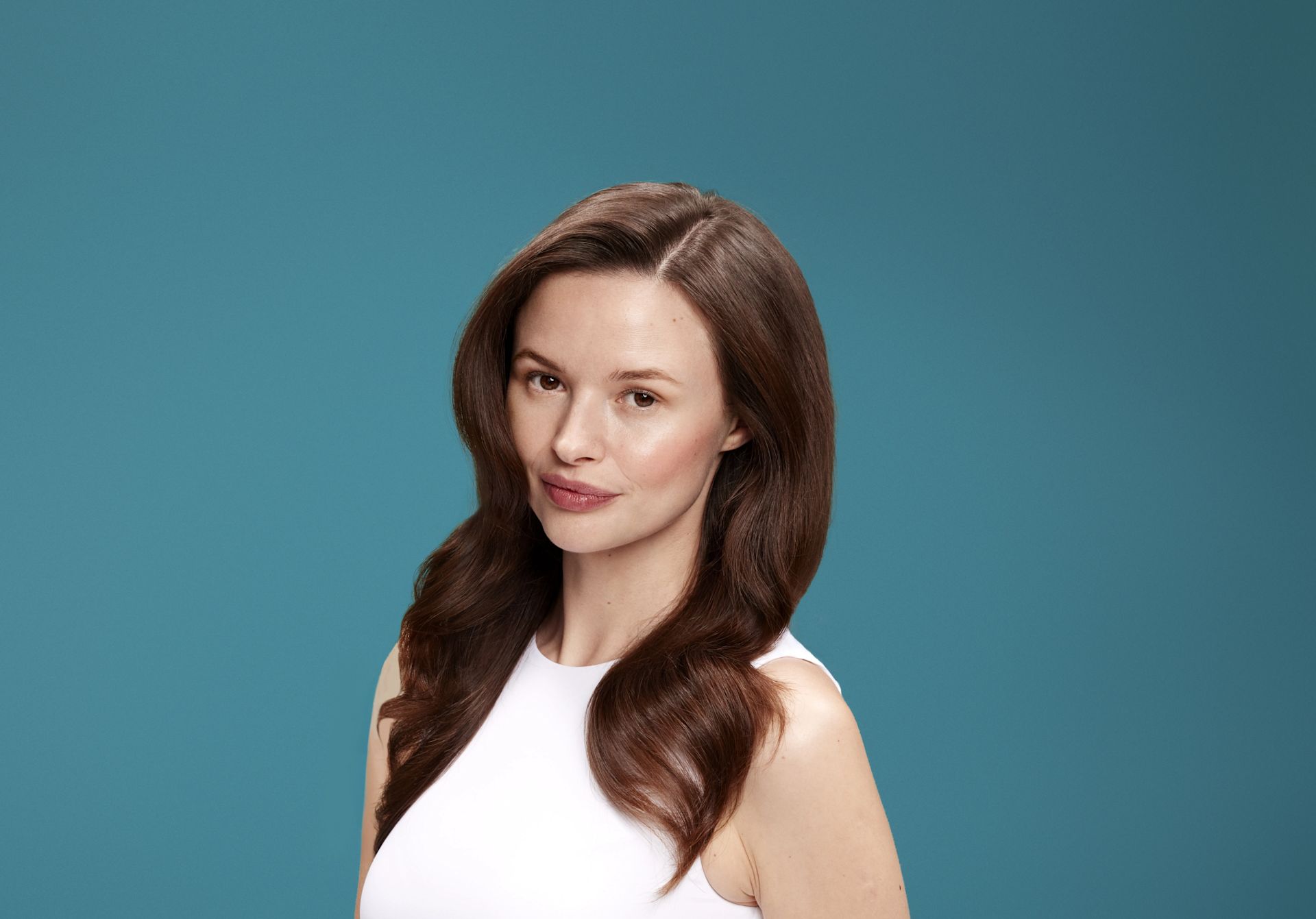 Woman with thicker hair after using ProGrowth + Peptide products
