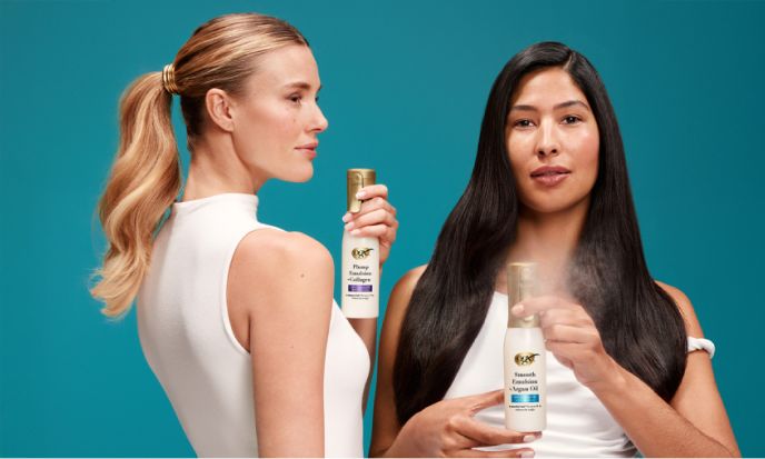 Power of oil lightweight as water. 2 women applying Conditioning Mists