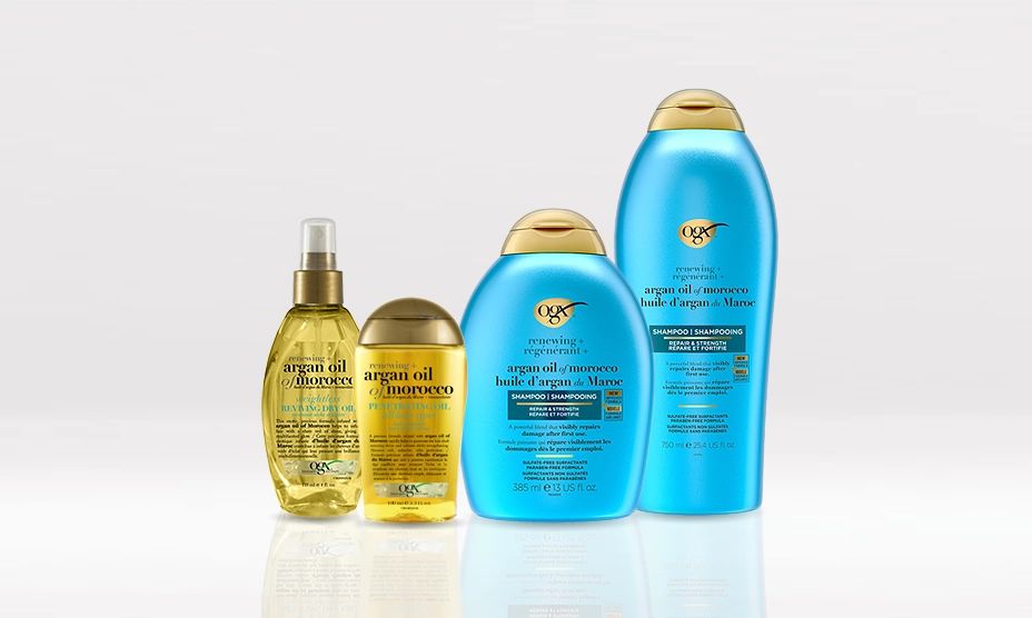 Une bannière présentant quatre produits de la gamme de soins capillaires Répare et fortifie d’OGX® Canada