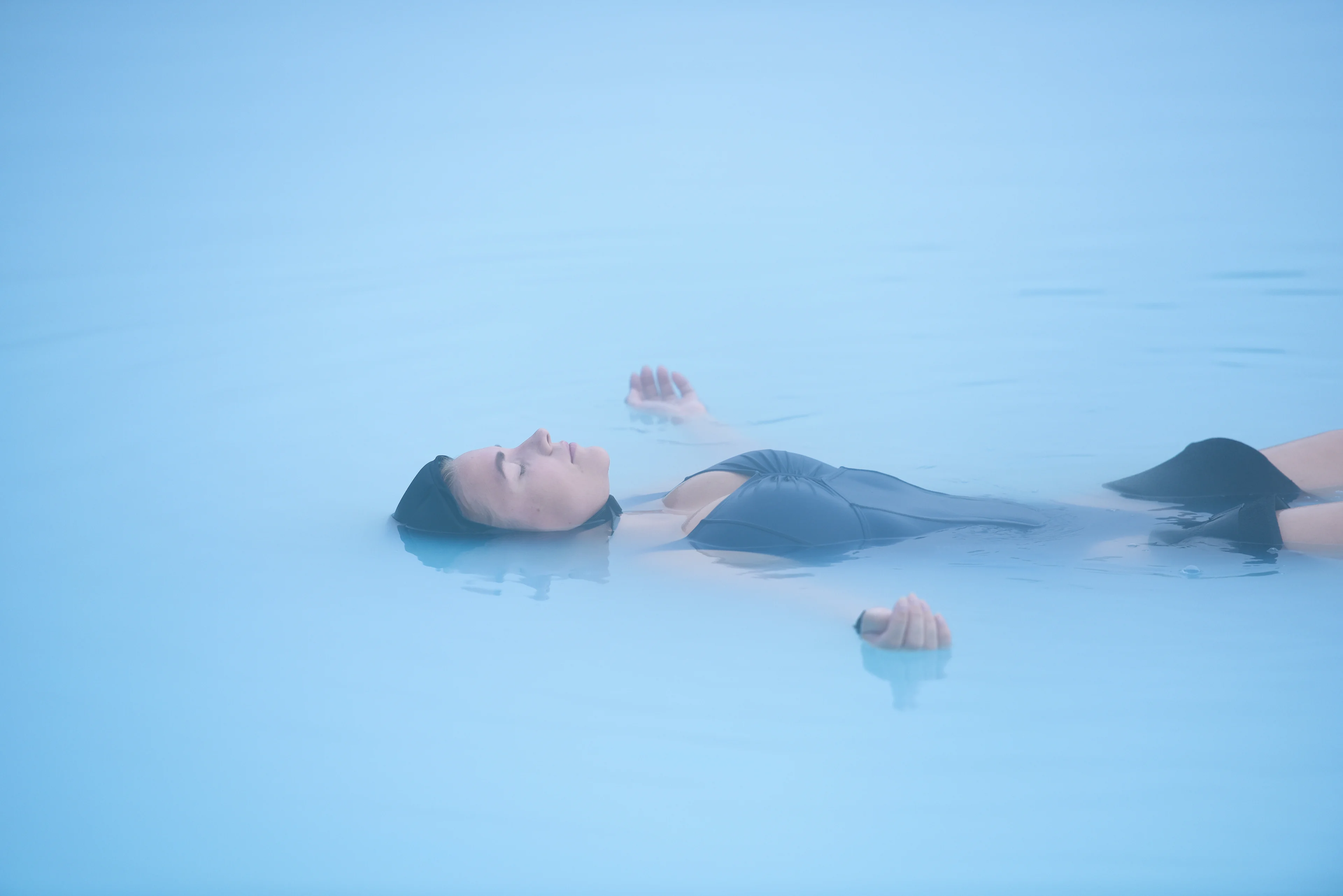 Woman relaxing in the Retreat Lagoon during morning floatation