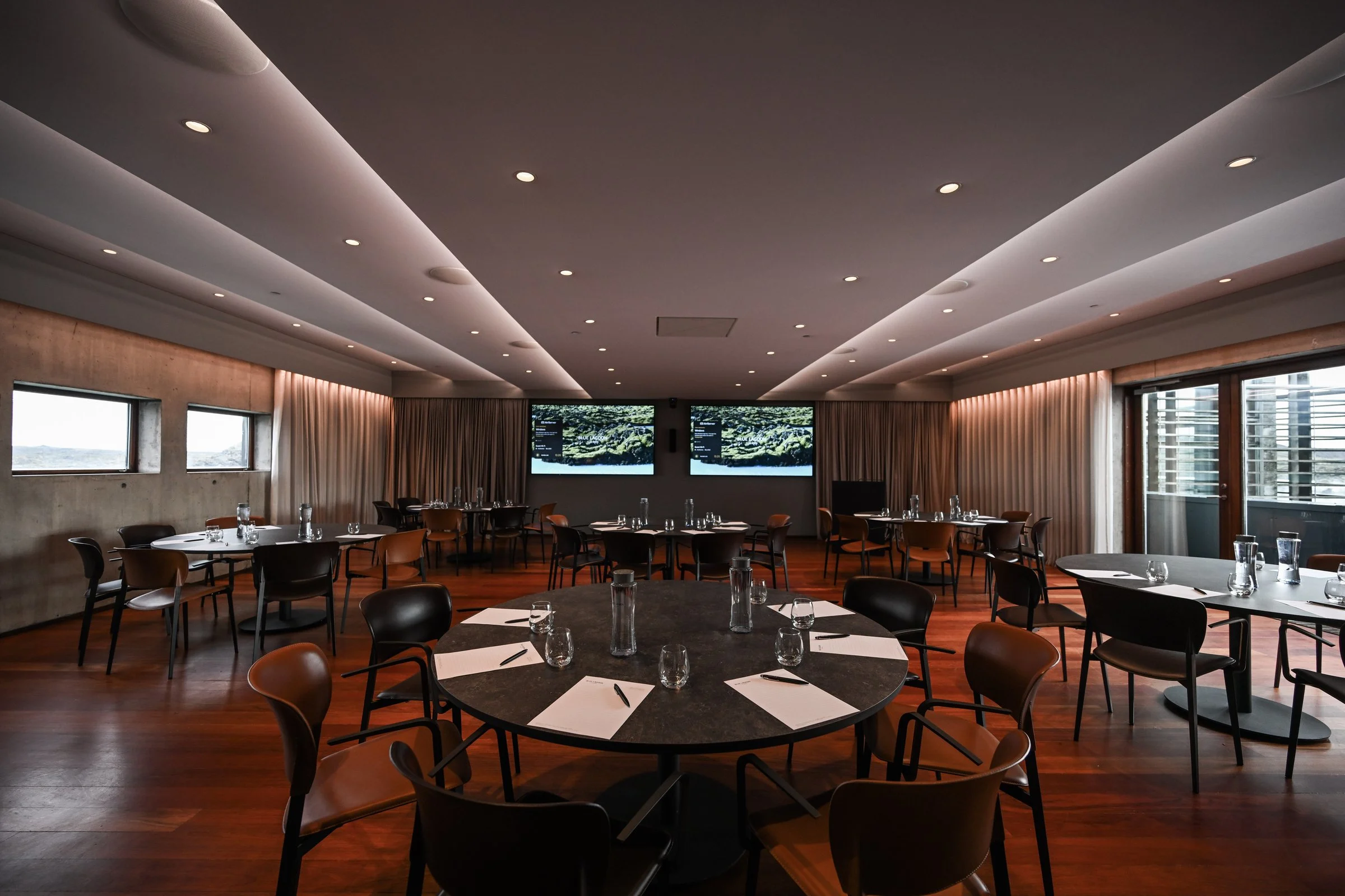 Meeting room set up with round tables at Blue Lagoon