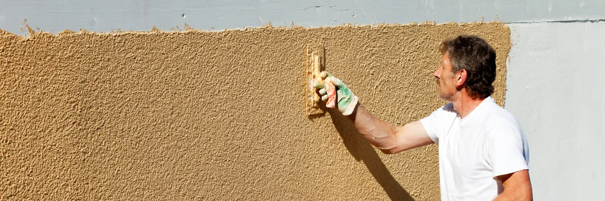 A professional rendering a white wall with an orange render.