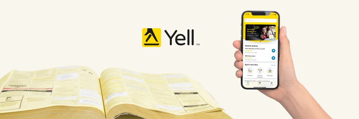 A copy of the Yellow Pages next to the Yell app on a smartphone.