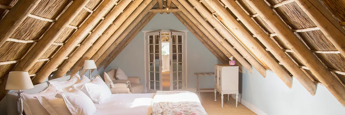A converted loft bedroom.