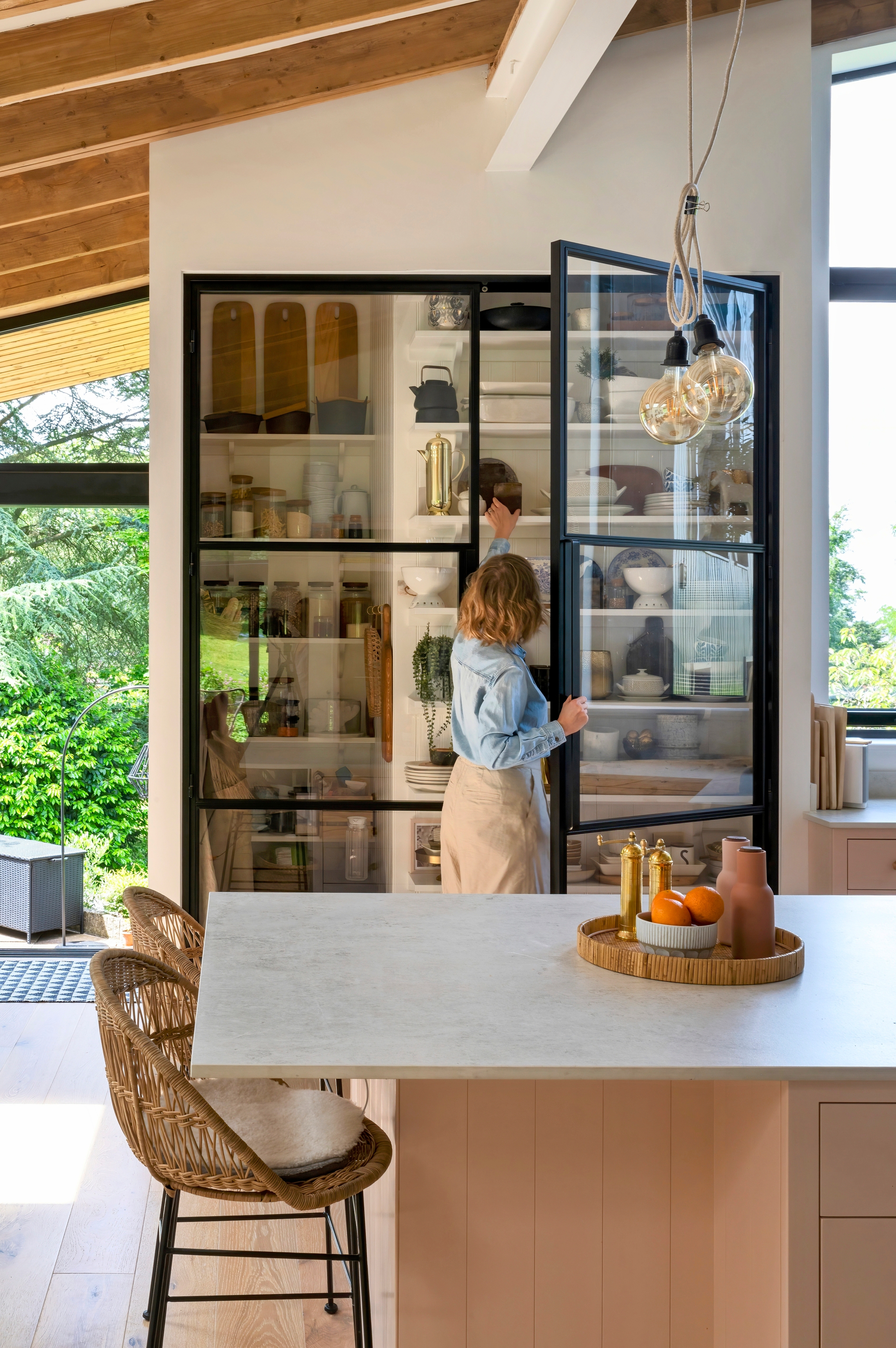 A walk-in pantry in the kitchen of an English single-family home