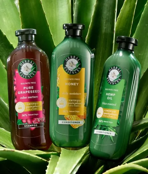 Herbal Essences Bio:Renew product being held up by hands