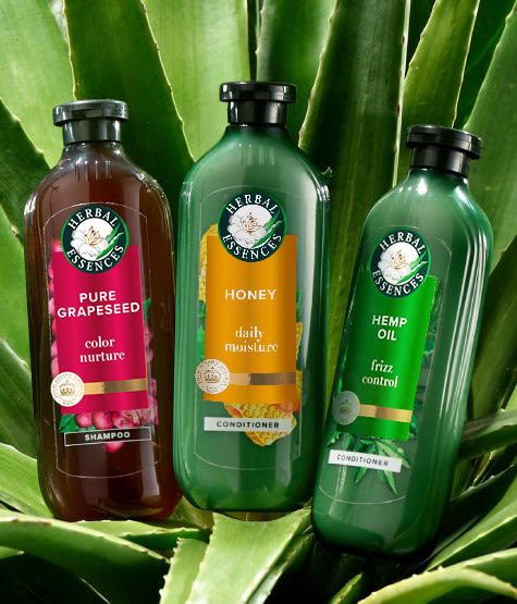 Herbal Essences Bio:Renew product being held up by hands