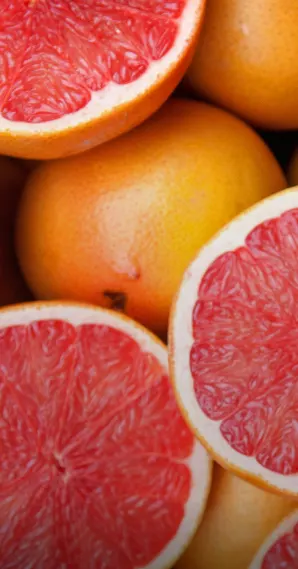 bunch of sliced and intact grapefruits