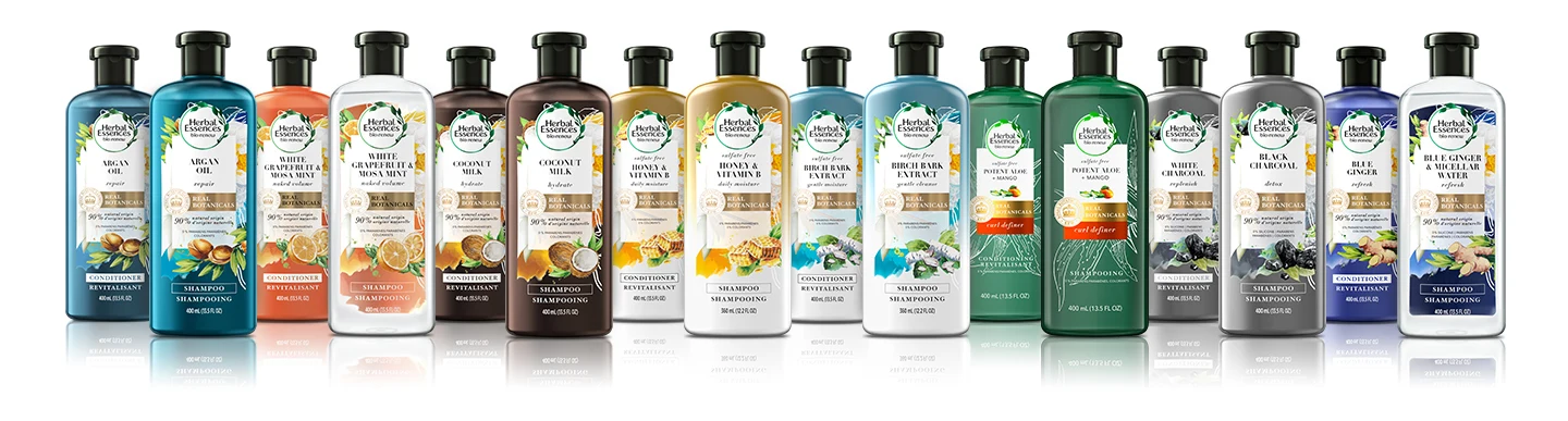 Bottles of Herbal Essences shampoo and conditioners top collections