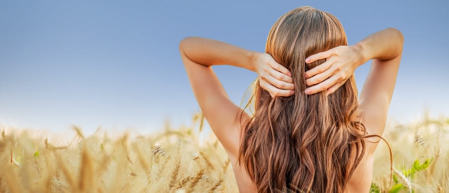 Caucasian woman with orange details