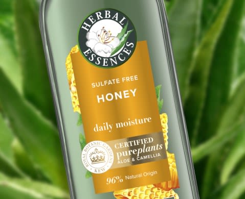 Herbal Essences Honey & Vitamin B Shampoo in hands