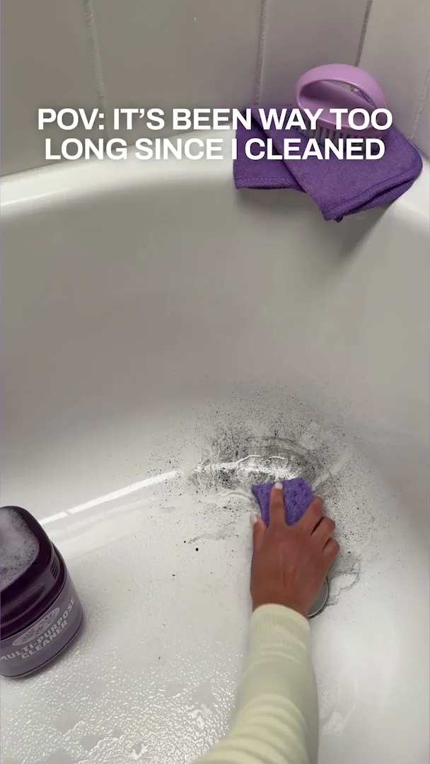 Person cleaning a dirty bathtub and the caption POV: It's been way too long since I cleaned