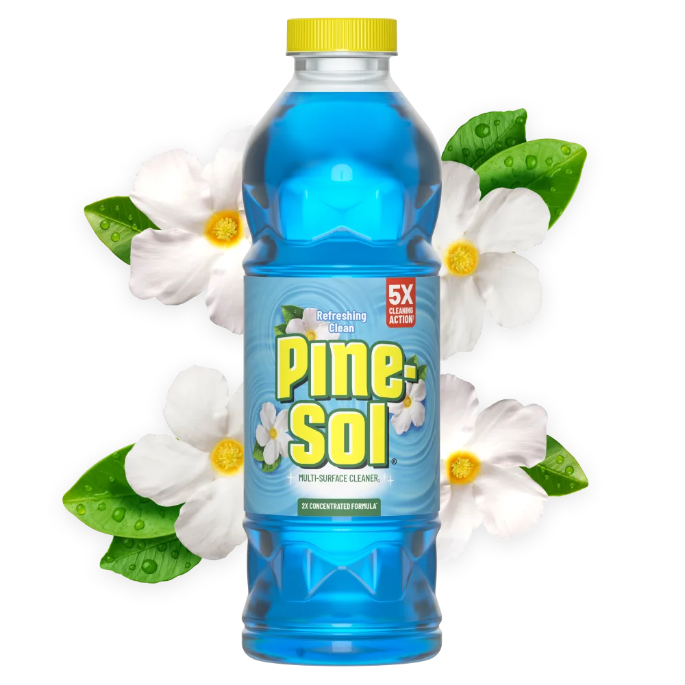 Bottle of Pine-Sol Refreshing Clean cleaner with white flower blossoms in background.