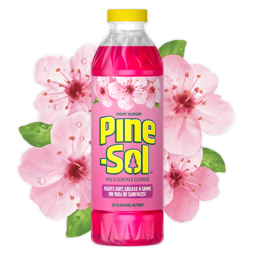Bottle of Pine-Sol cleaner, Cherry Blossom scent, cherry blossoms in background.