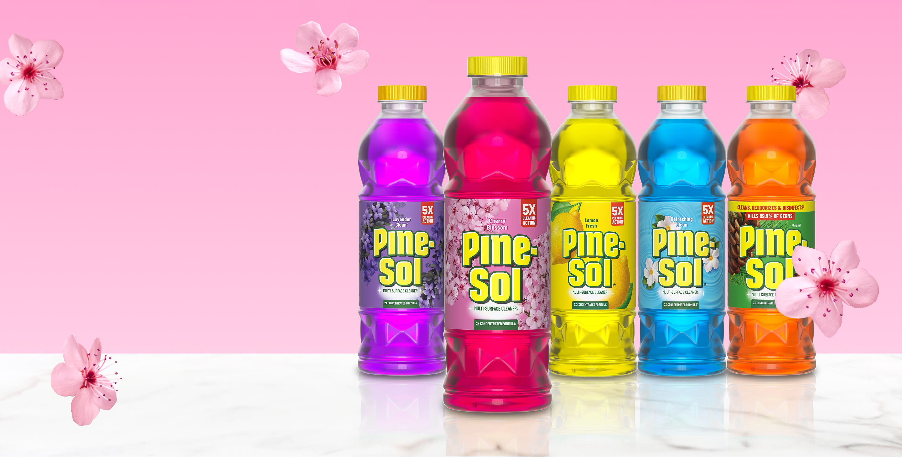 Lineup of bottles of Pine-Sol cleaner in 5 scents on white marble surface with cherry blossom accents on pink background.
