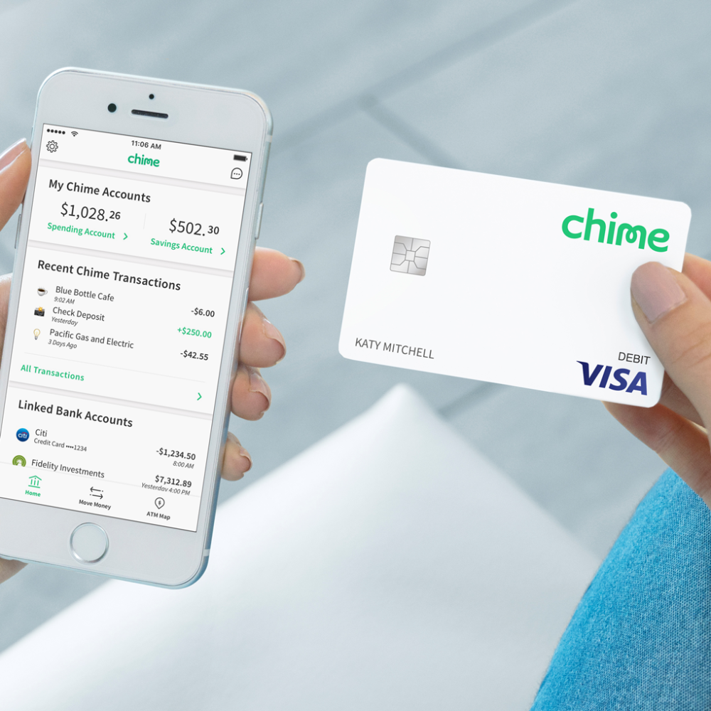 Cellphone with Chime application displaying on screen and hand holding a Chime debit card