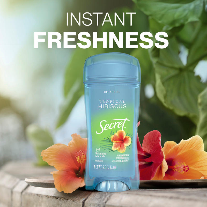Instant freshness. Secret clear gel deodorant  with a hibiscus flower, surrounded by lush green leaves
