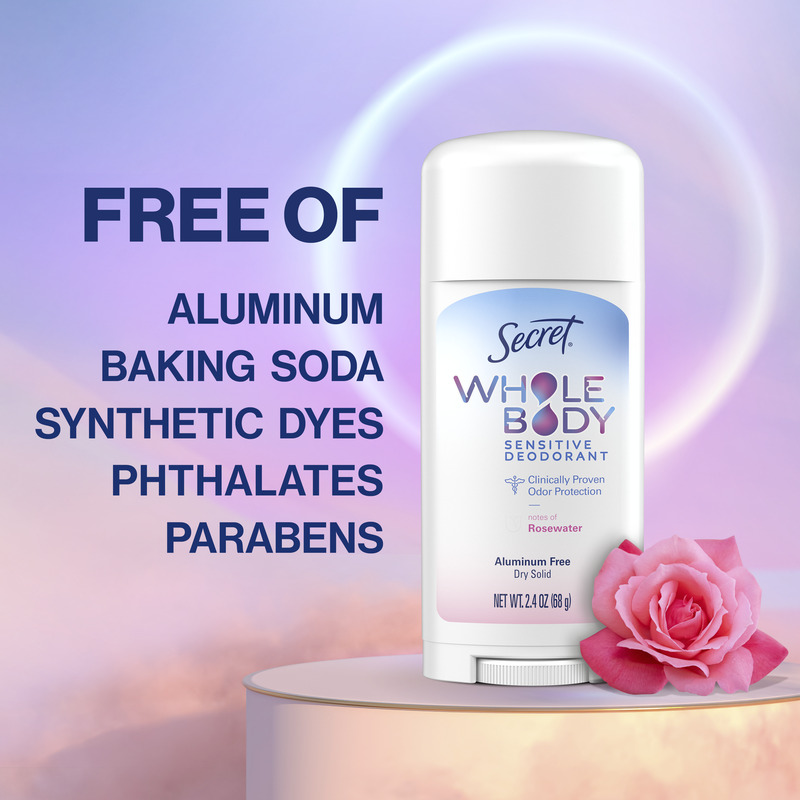 Whole body dry solid by Secret on a floral design, highlighting its free of aluminum, baking soda, synthetic dyes, phthalates, and parabens formula