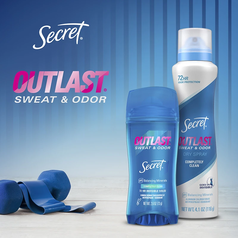 A bottle of deodorant and dumbbells