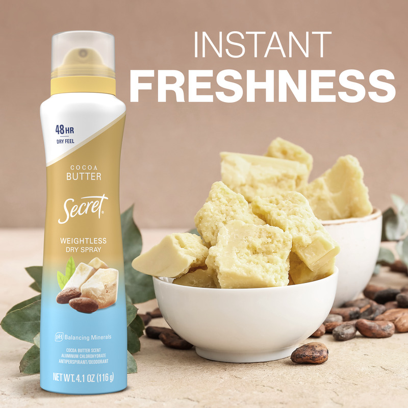 Cocoa butter weightless dry spray by Secret, Instant Freshness, surrounded by cocoa butter chunks and sugar cubes on a neutral background