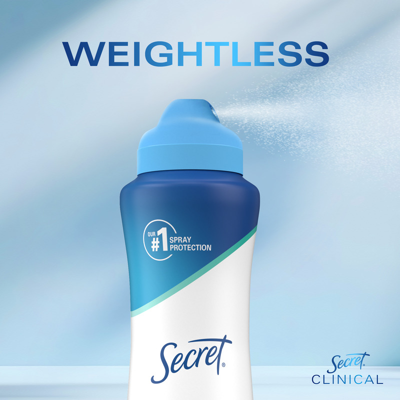 Bottle of Secret Clinical deodorant featuring the text Weightless, emphasizing spray protection and confidence in daily use