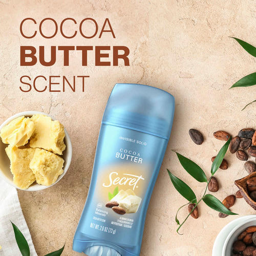 Cocoa butter scent Secret deodorant with natural ingredients, alongside cocoa beans and shea butter pieces on a textured surface