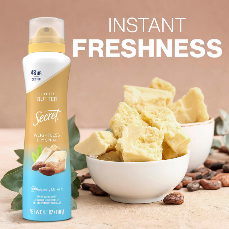Cocoa butter weightless dry spray by Secret, Instant Freshness, surrounded by cocoa butter chunks and sugar cubes on a neutral background