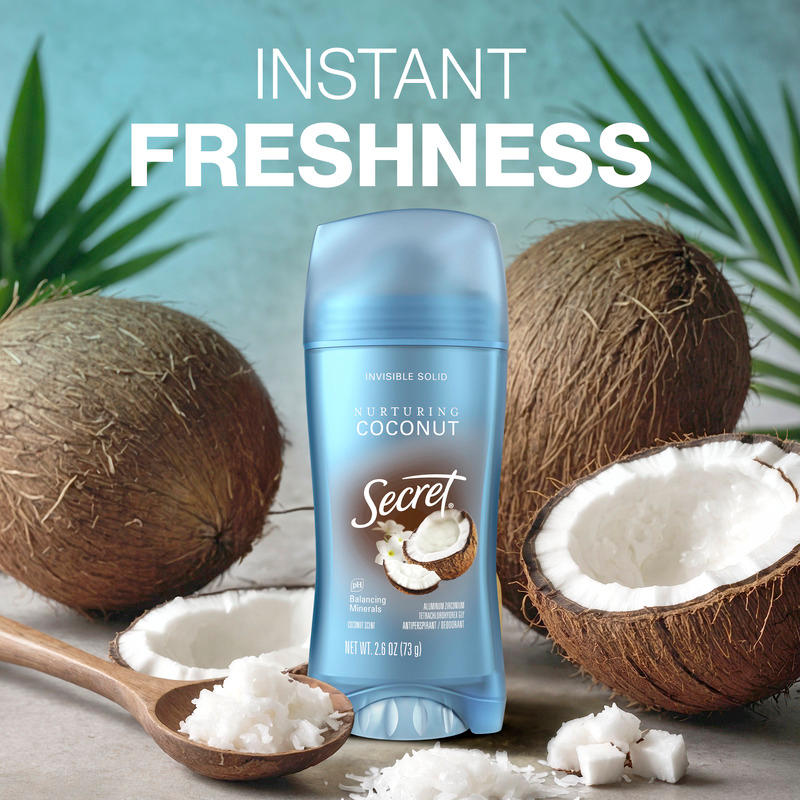 Instant freshness. Secret deodorant with nurturing coconut scent next to whole and sliced coconuts