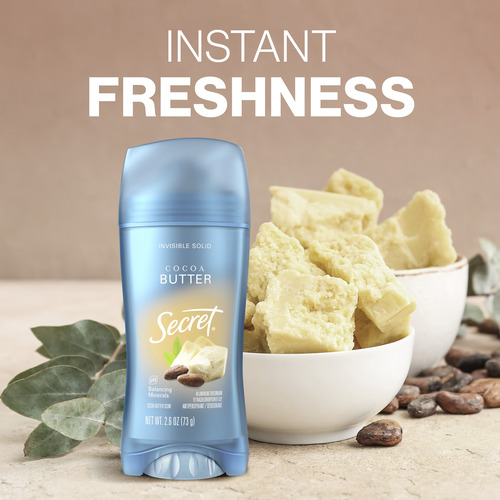 Cocoa butter Secret deodorant stick next to cocoa butter chunks in a bowl, emphasizing instant freshness with a natural look