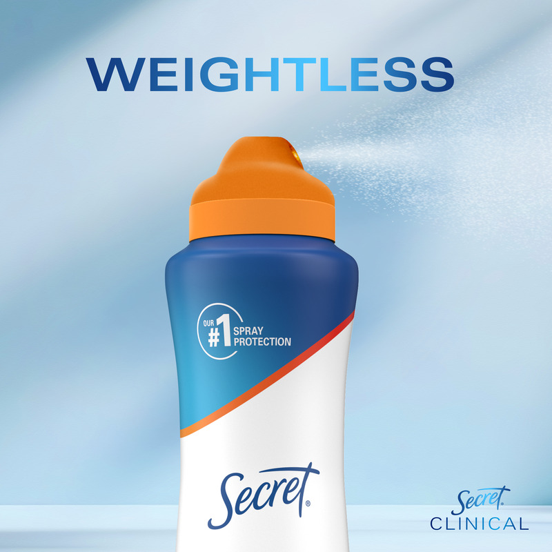 Weightless Secret Clinical deodorant spray bottle with orange cap in a light blue background, highlighting number one spray protection claim