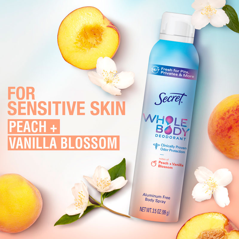 Secret Whole Body Peach & vanilla Deodorant Spray Bottle on a fruity background
