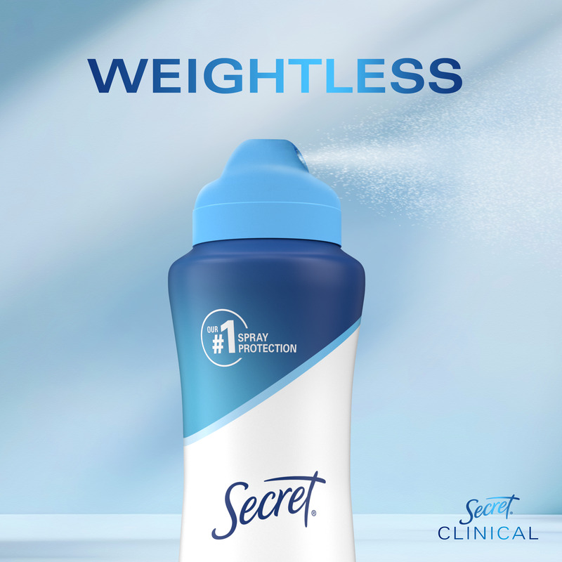 Bottle of Secret Clinical deodorant featuring the text Weightless, emphasizing spray protection and confidence in daily use