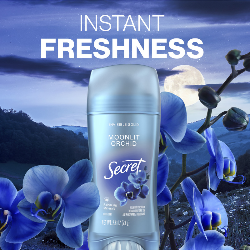 Secret Moonlit Orchid deodorant surrounded by blue orchids under a night sky, promoting a feeling of instant freshness and balance