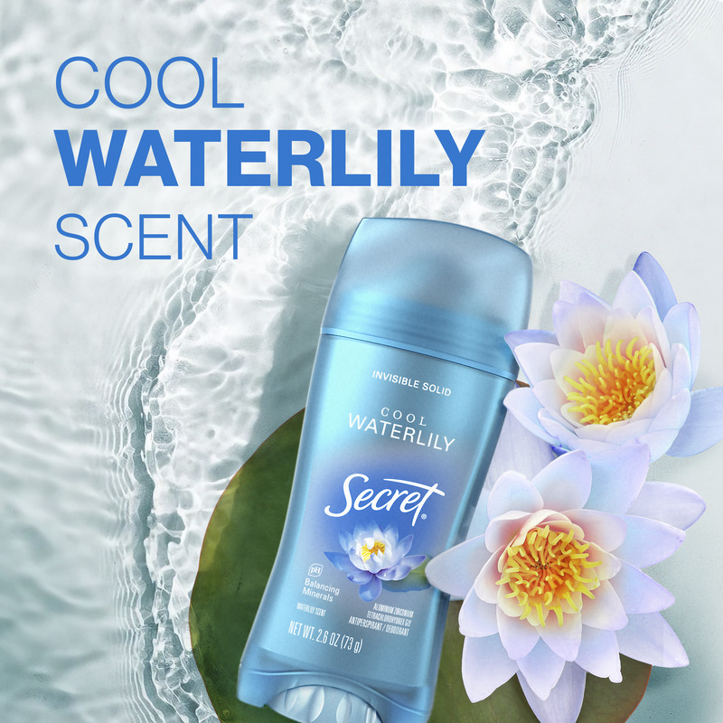 Secret Cool Waterlily scented deodorant stick displayed alongside water lilies, highlighting freshness and floral fragrance