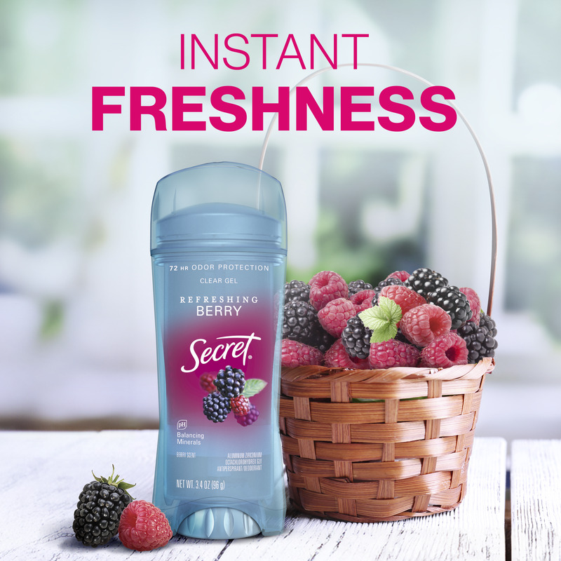 Instant freshness. Secret clear gel deodorant in refreshing berry scent beside a wicker basket filled with vibrant raspberries and blackberries