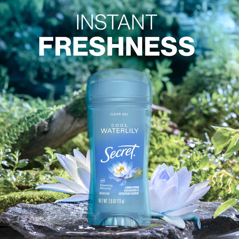 Instant freshness. Secret clear gel deodorant bottle, set against a nature backdrop with greenery and water lilies