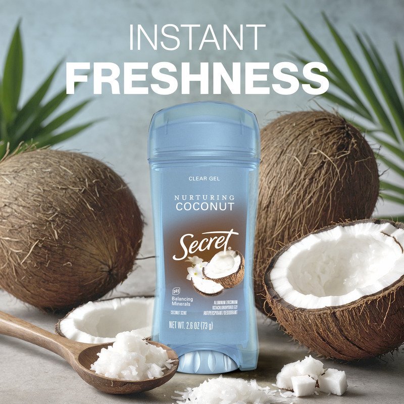 Secret clear gel deodorant titled Nurturing Coconut placed beside whole and halved coconuts, emphasizing instant freshness and natural ingredients