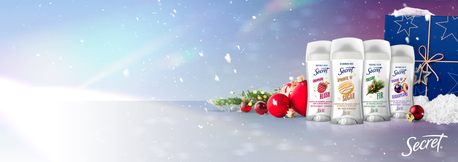 Secret brand deodorants in festive packaging with holiday decorations and a snowy backdrop showcasing seasonal scents and designs
