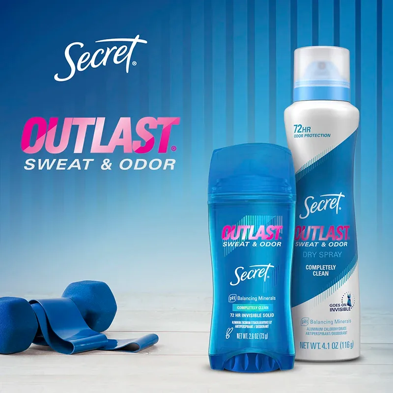 A bottle of deodorant and dumbbells