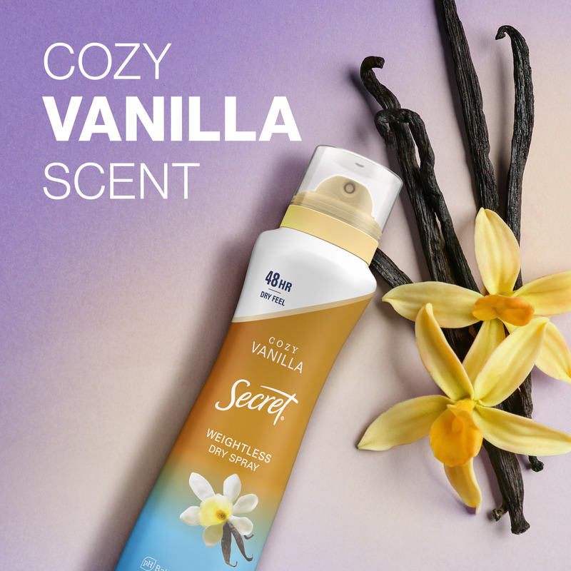 Cozy vanilla scent dry spray by Secret with flower and vanilla pods on a soft gradient background showcasing its weightless, long-lasting freshness