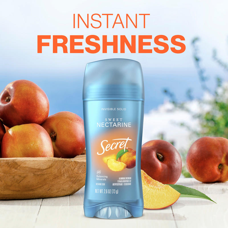 Secret Sweet Nectarine deodorant stick with fresh nectarines in the background, emphasizing instant freshness for all-day confidence