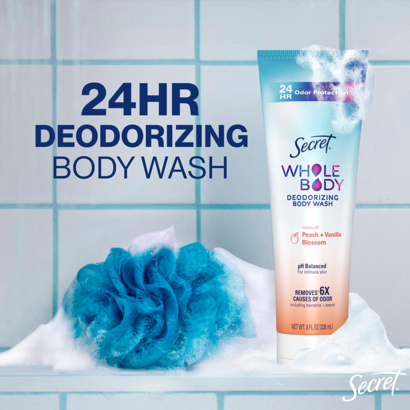 24HR deodorizing body wash by Secret with notes of peach and vanilla blossom in a bathroom setting