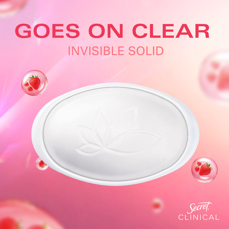 Clear invisible solid deodorant with lotus design on a soft, colorful background featuring strawberry elements