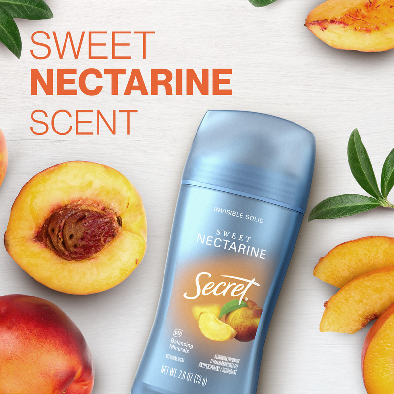 Secret deodorant stick featuring Sweet Nectarine scent, surrounded by fresh nectarines and peach slices on a light background