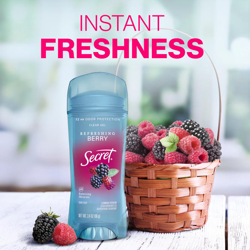 Instant freshness. Secret clear gel deodorant in refreshing berry scent beside a wicker basket filled with vibrant raspberries and blackberries