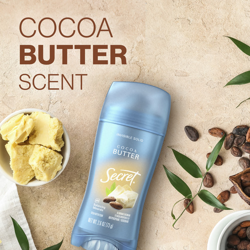 Cocoa butter scent Secret deodorant with natural ingredients, alongside cocoa beans and shea butter pieces on a textured surface