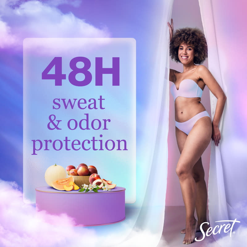 Model showcasing Secret deodorant with 48H sweat and odor protection, surrounded by fresh fruits and a soft, colorful background